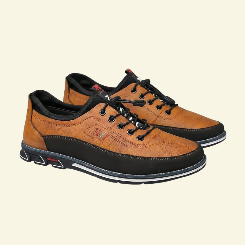Brązowe sneakersy męskie o casualowej formie, wykonane ze skóry ekologicznej, zaprezentowane na jasnym tle w ujęciu produktowym.