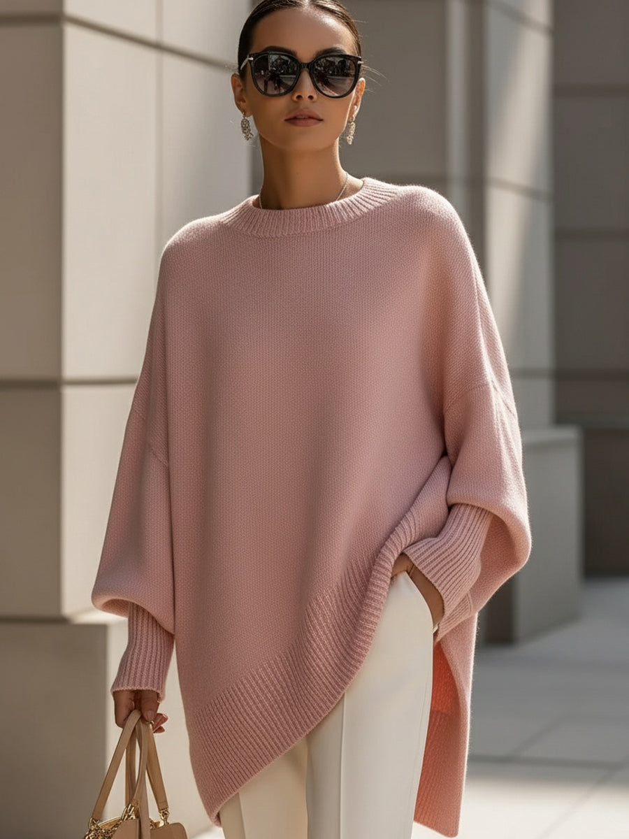 Sweter oversize damski w kolorze pudrowego różu z asymetrycznym dołem — Lubomirske